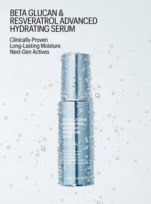 Bottle of Beta Glucan & Resveratrol Advanced Hydrating Serum with water droplets on a light gray background