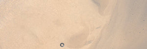 Mobile banner of sandy beige serum texture with small bubbles for the Allies of Skin founders routine